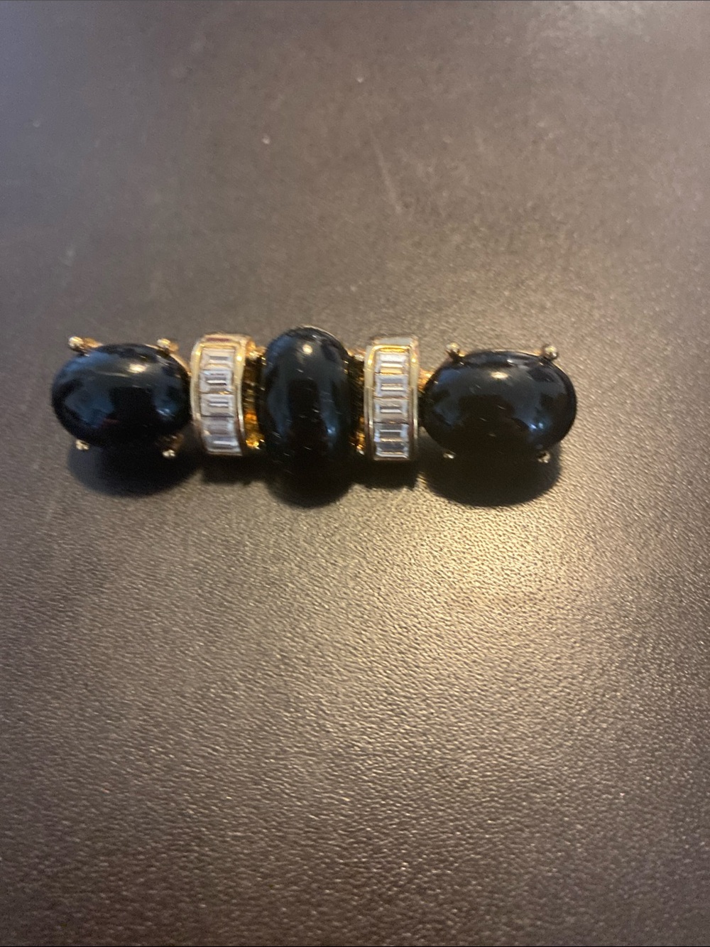 Elegant Black Cabochon Trio Gold-Tone Brooch with Crystal Accents